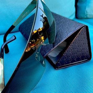 Used Gucci sunglasses with original case. In excellent condition.